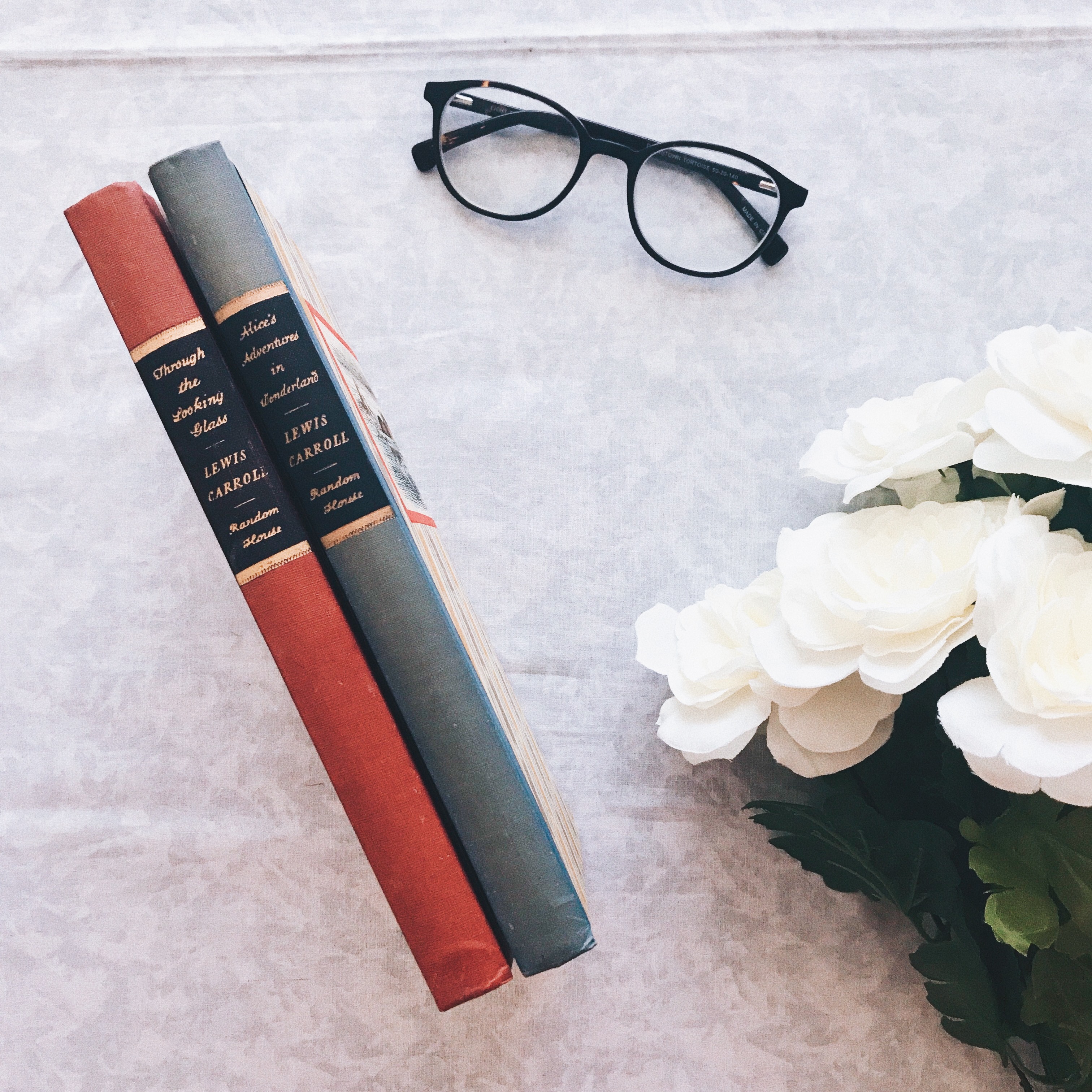 glasses with books and flowers in september